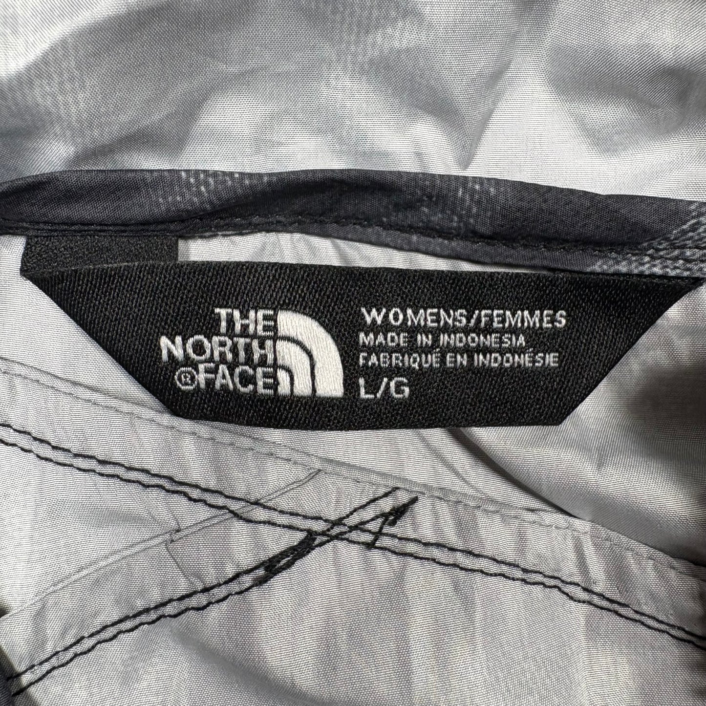 (L) The North Face Windbreaker